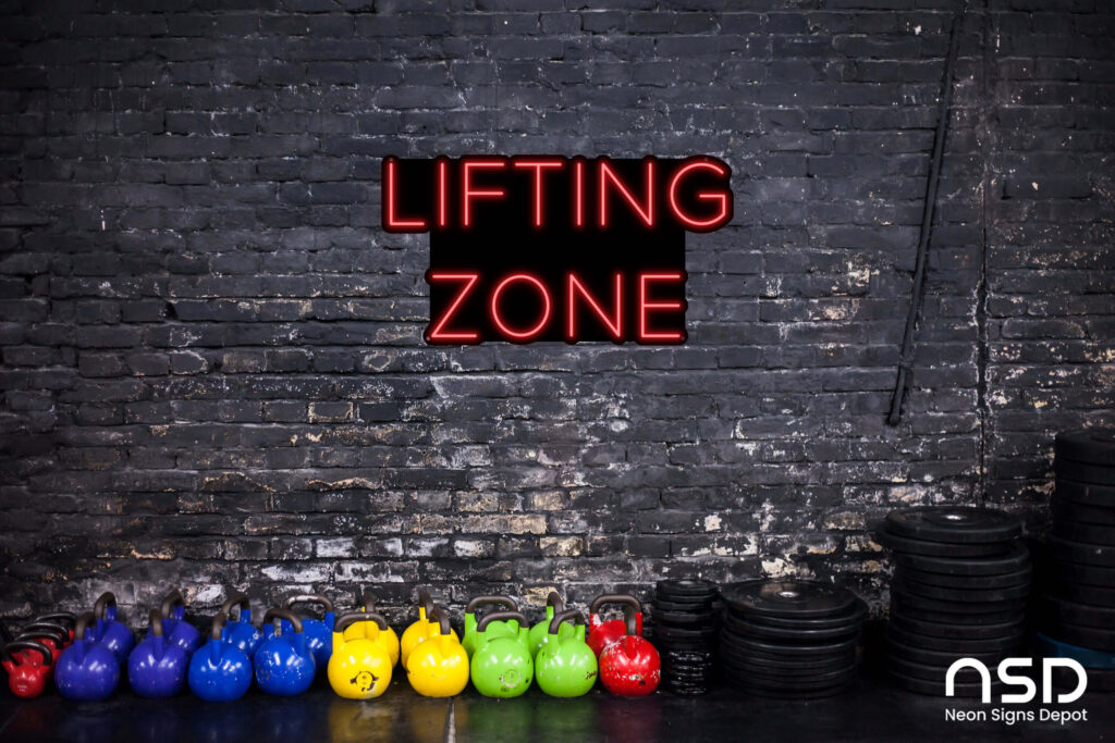 Custom gym logo neon sign on a feature wall